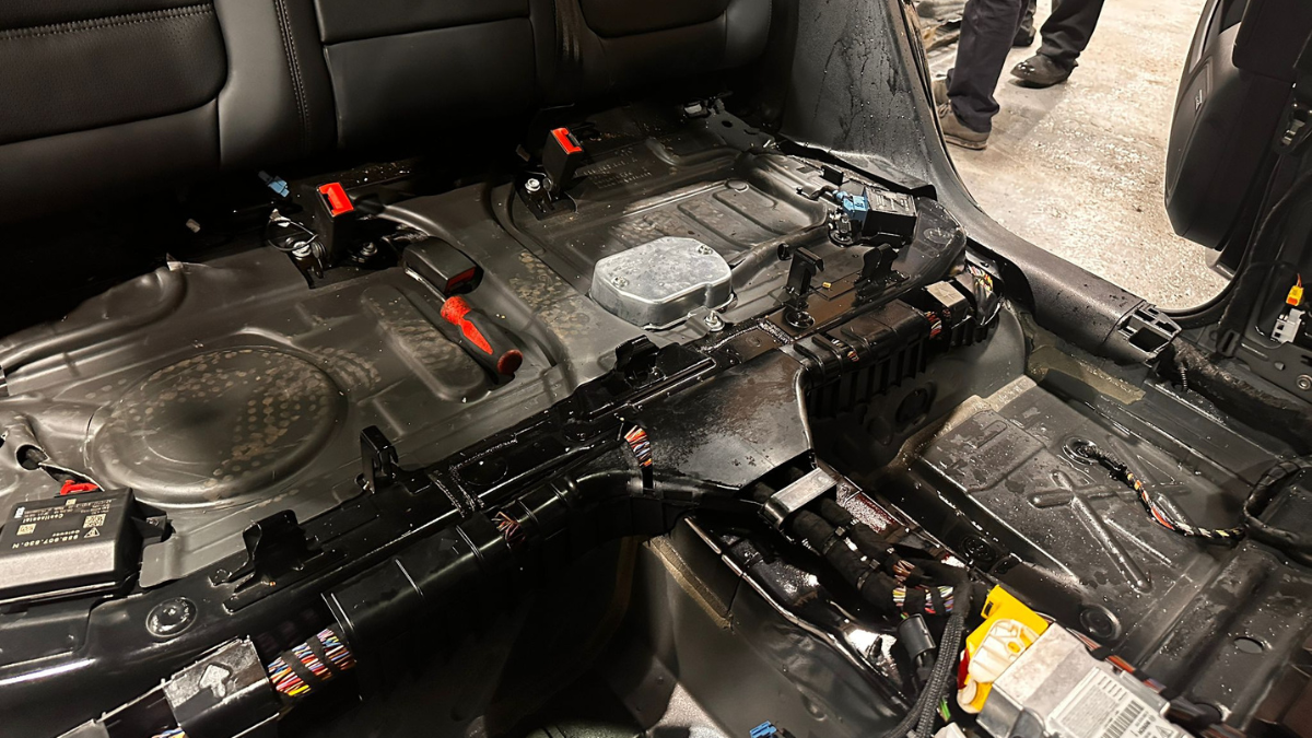 HallCraft technicians examine for damage following Panoramic Roof failure.